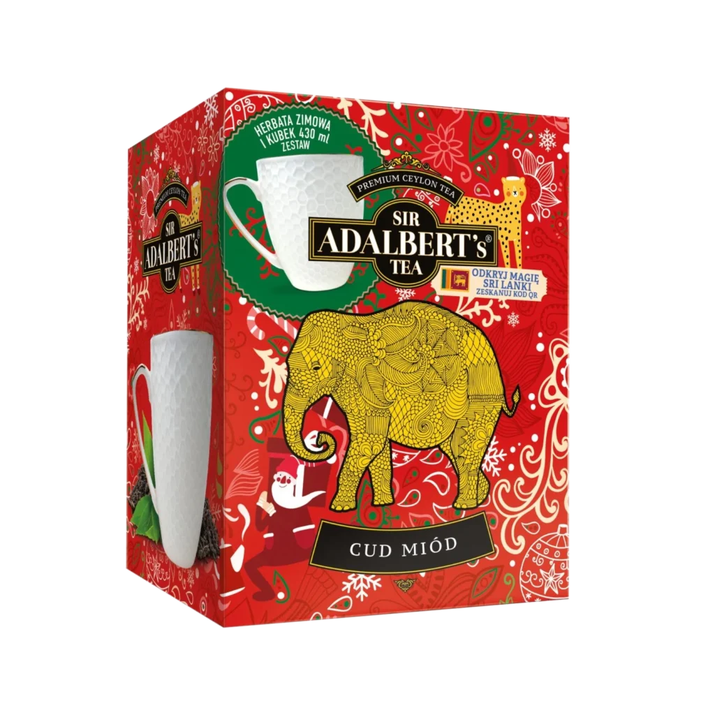 Zestaw herbaciany Sir Adalbert's Tea Cud Miód z zimową herbatą i eleganckim kubkiem o pojemności 430 ml. Wyjątkowy prezent na zimowe wieczory, inspirowany magią Sri Lanki, w atrakcyjnym opakowaniu z motywem słonia.