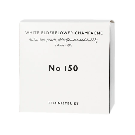 Opakowanie herbaty Teministeriet No 150 White Elderflower Champagne, zawierającej białą herbatę, brzoskwinię, kwiaty bzu i nutę bąbelków. Herbata zalecana do zaparzania w temperaturze 70°C przez 2–4 minuty. Minimalistyczne białe pudełko z czarnymi napisami, typowe dla eleganckiego stylu marki Teministeriet.